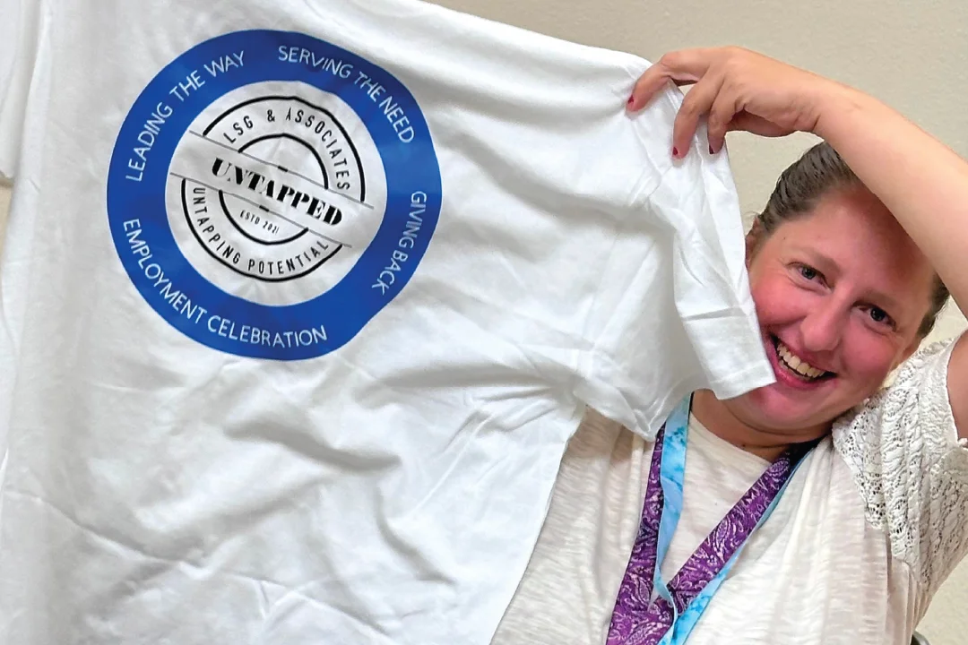 Kimmy displaying the UNTAPPED t-shirt gifted to her.