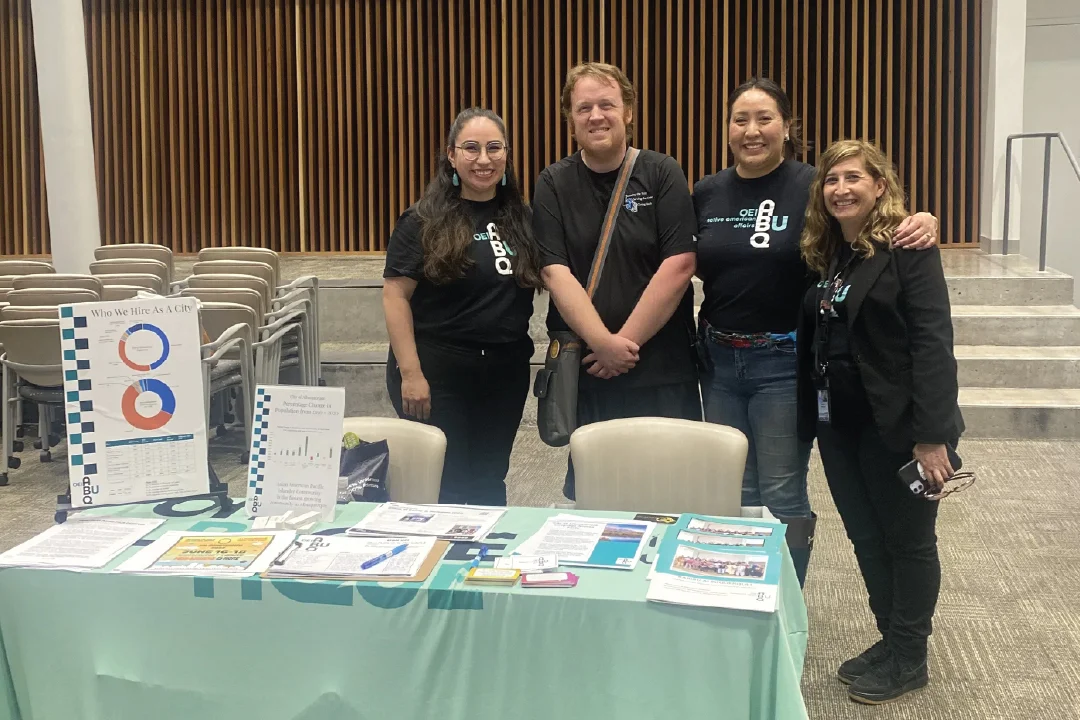 The OEI team at the job fair with Dr. Anderson